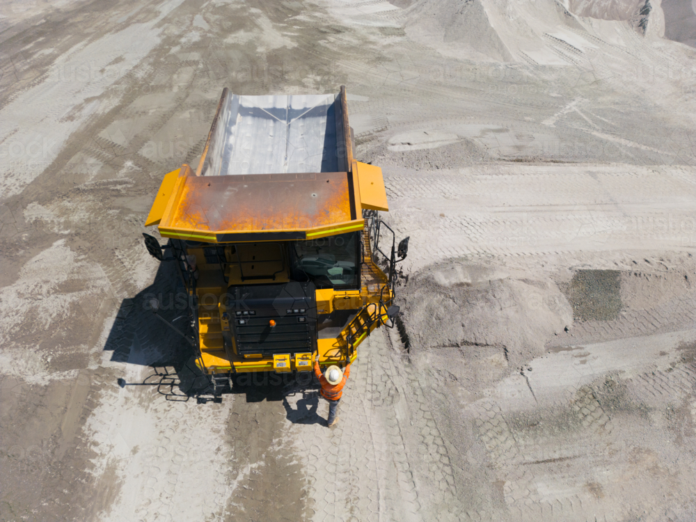 Aerial view of a dump truck in an open cut mine - Australian Stock Image