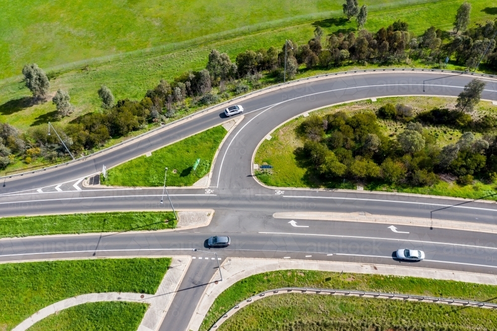 Aerial view of a freeway on and off ramp intersection - Australian Stock Image
