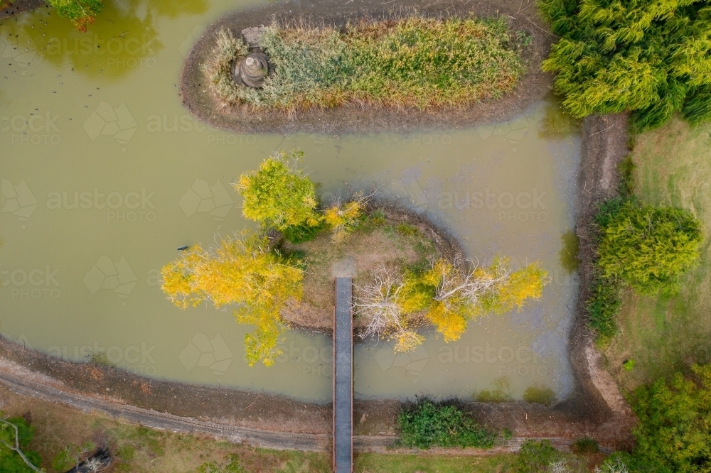 Aerial view of a garden lake with islands in Autumn - Australian Stock Image