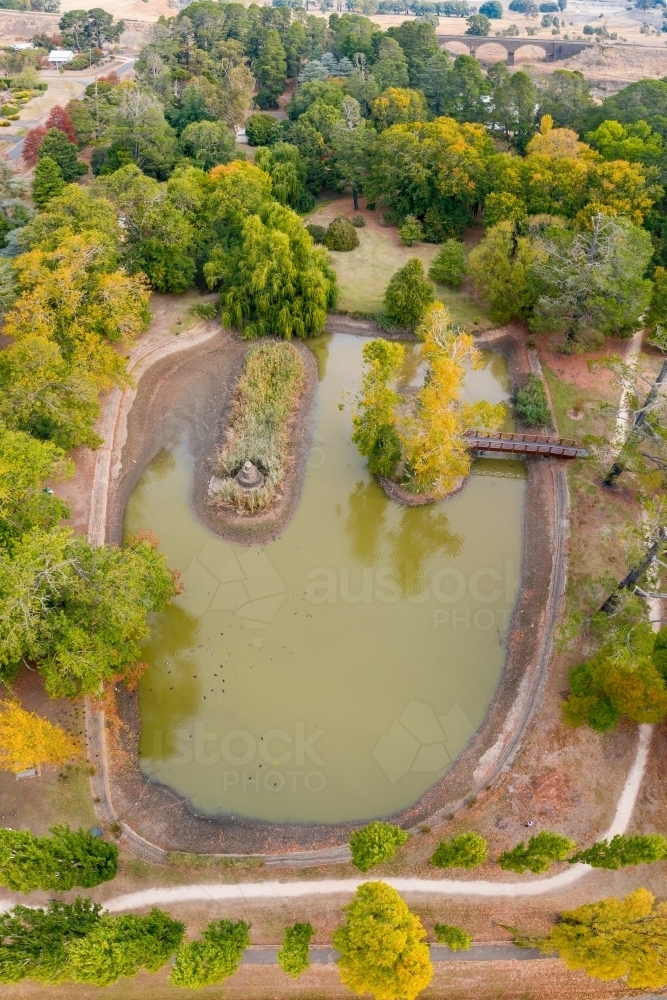 Aerial view of a garden lake with islands in Autumn - Australian Stock Image