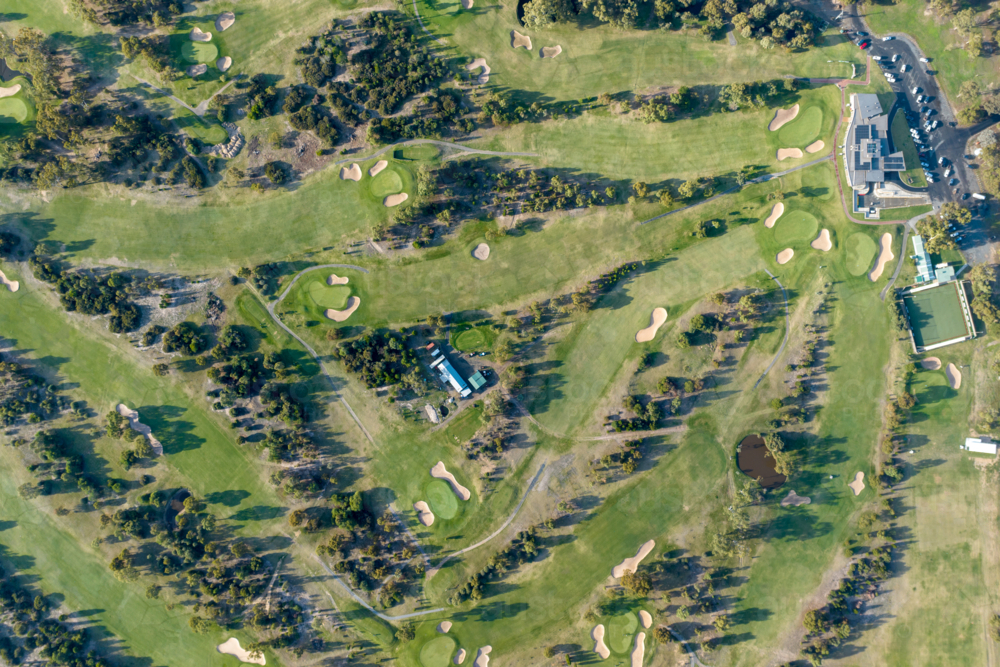 Aerial view of a golf course with clubhouse and bowling green - Australian Stock Image