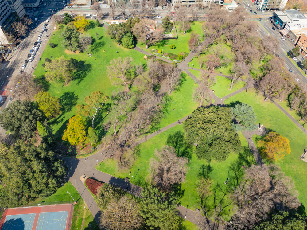 Aerial view of a green inner city park with criss crossing walking paths - Australian Stock Image