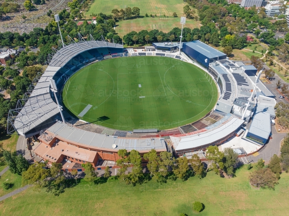 Aerial view of a large Aussie rules Football Stadium surrounded by parkland - Australian Stock Image