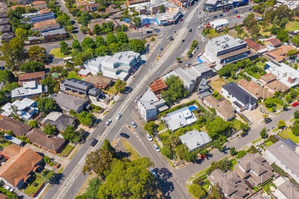 Aerial view of a major road running through a city suburb - Australian Stock Image