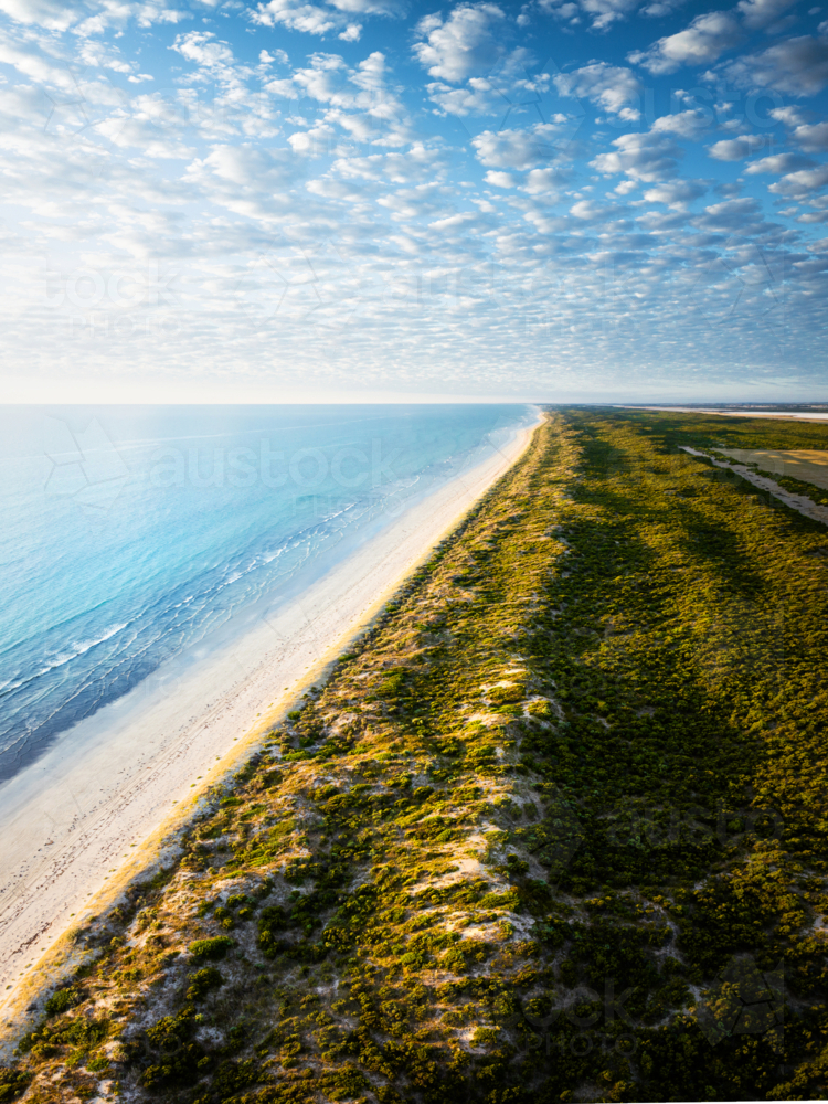 Aerial view of a pristine long stretch of The Granites coastline - Australian Stock Image
