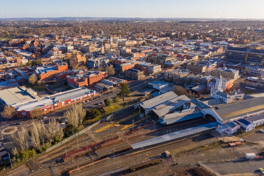 Aerial view of a railway station and surrounding historic buildings of a regional city - Australian Stock Image
