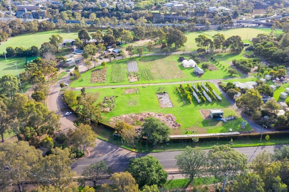 Aerial view of a road curving around a garden nursery - Australian Stock Image