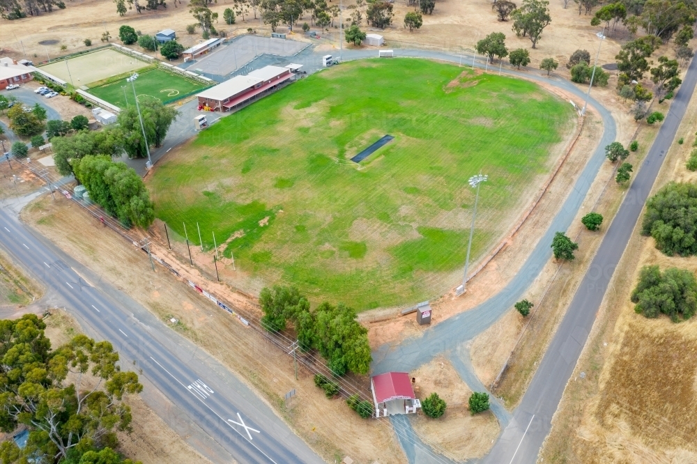 Aerial view of a rural football oval and clubrooms - Australian Stock Image