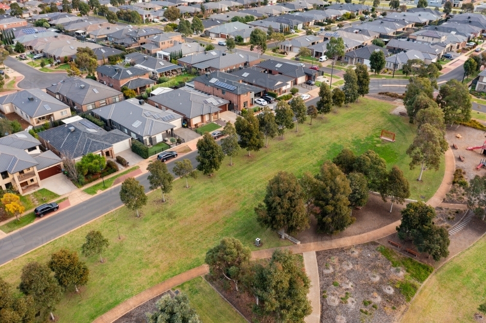 Aerial view of a small suburban park amongst housing - Australian Stock Image