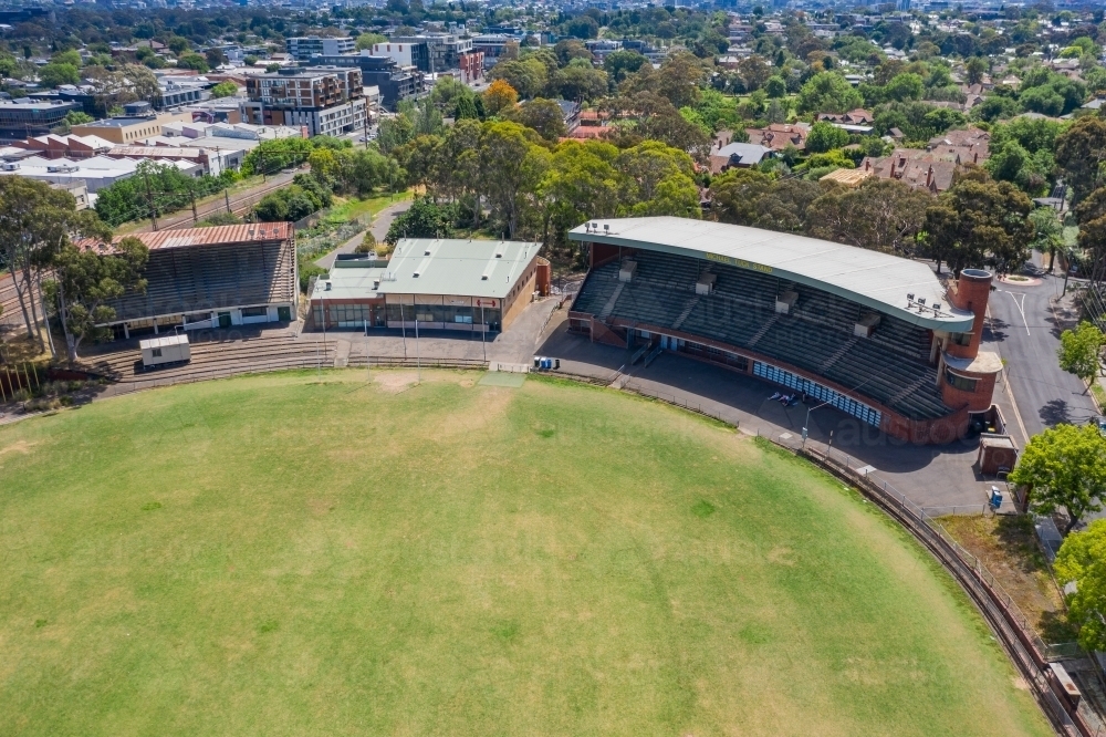 Aerial view of a suburban football oval and grandstand - Australian Stock Image