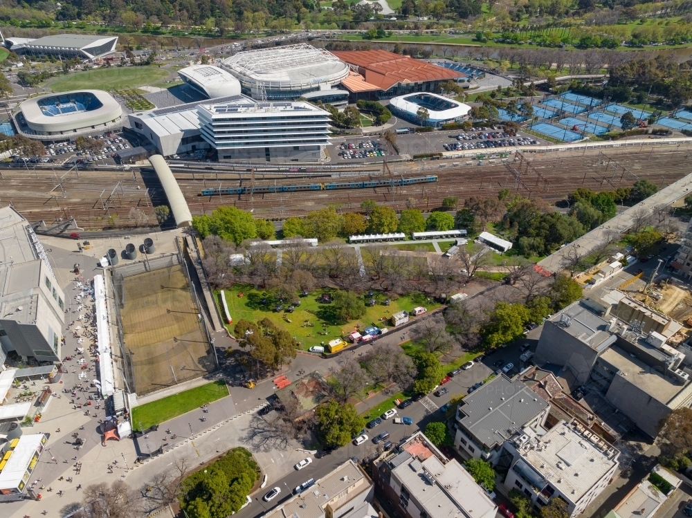 Aerial view of a triangular shaped park between railway lines and sport stadiums - Australian Stock Image