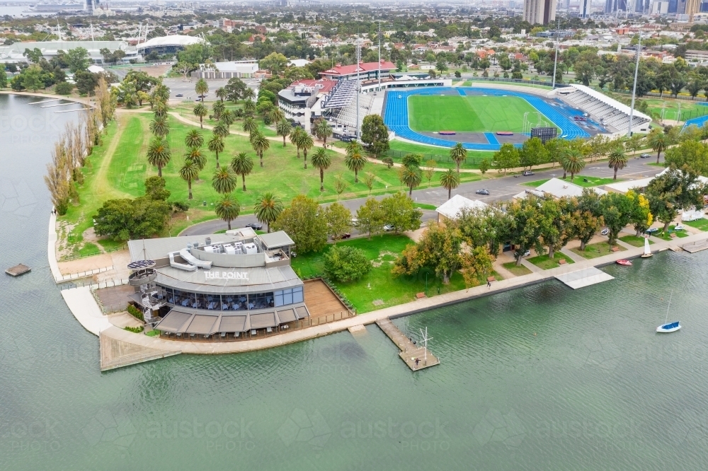 Aerial view of a waterfront parkland and sporting arena on the shores of a lake - Australian Stock Image