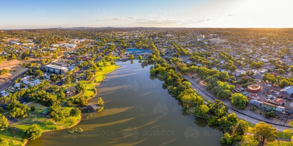 Aerial view of an city lake surrounded by trees - Australian Stock Image