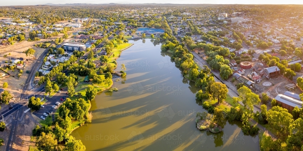 Aerial view of an city lake surrounded by trees - Australian Stock Image