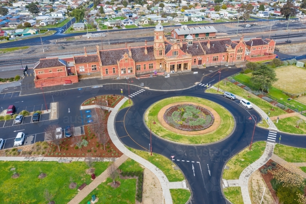 Aerial view of an historic railway station near a roundabout - Australian Stock Image