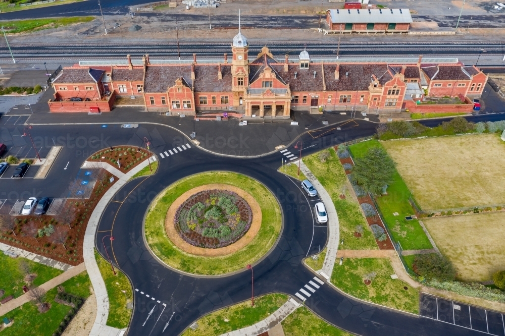 Aerial view of an historic railway station near a roundabout - Australian Stock Image