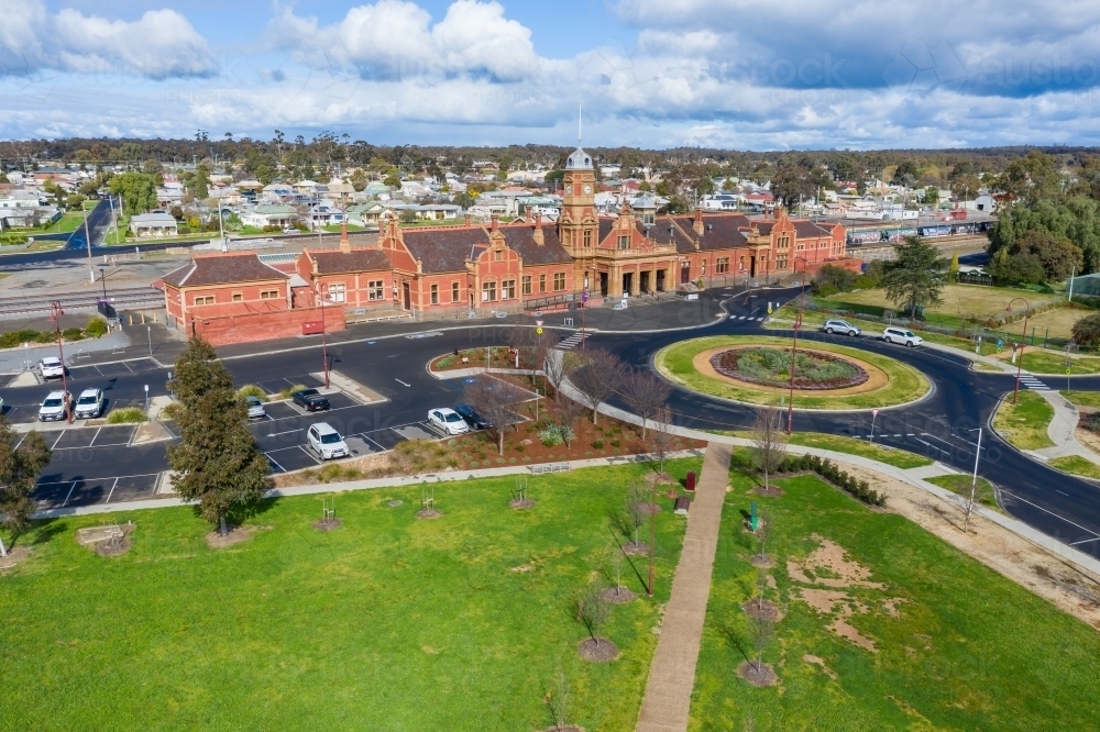 Aerial view of an historic railway station near a roundabout - Australian Stock Image