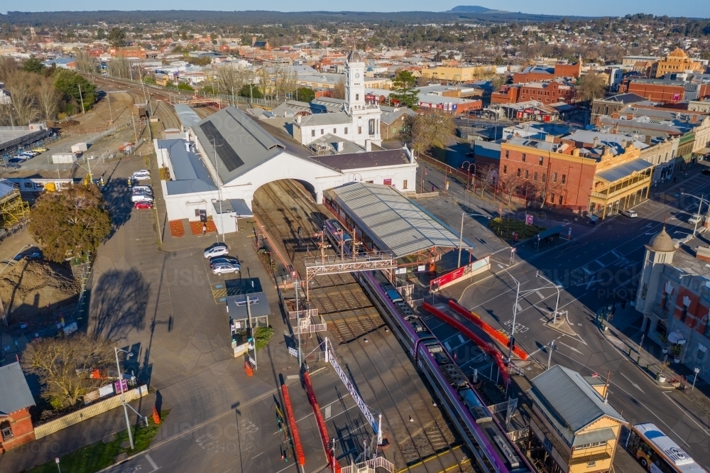 Aerial view of an historic regional railway station and tracks - Australian Stock Image