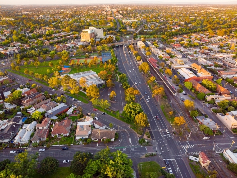 Aerial view of an inner city suburb and road network in late afternoon light : Austockphoto Aerial view of an inner city suburb and road network in late afternoon light - Australian Stock Image