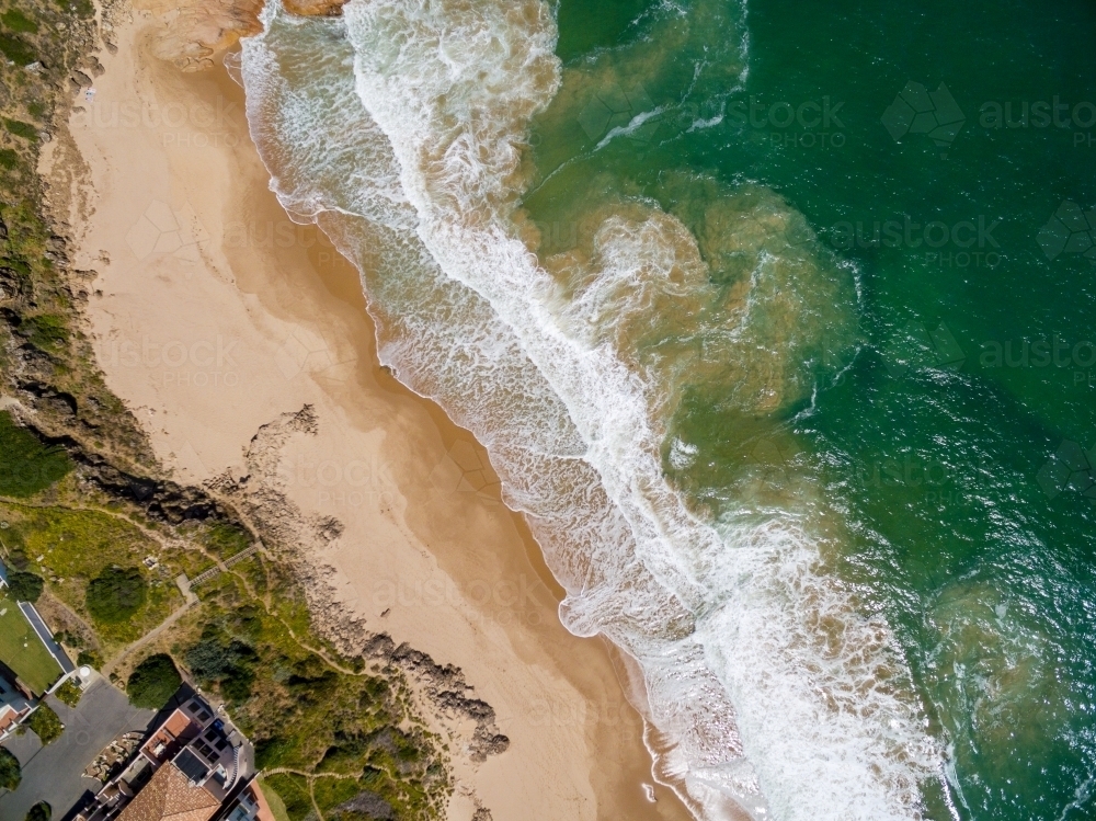 aerial view of beach and waterfront houses - Australian Stock Image
