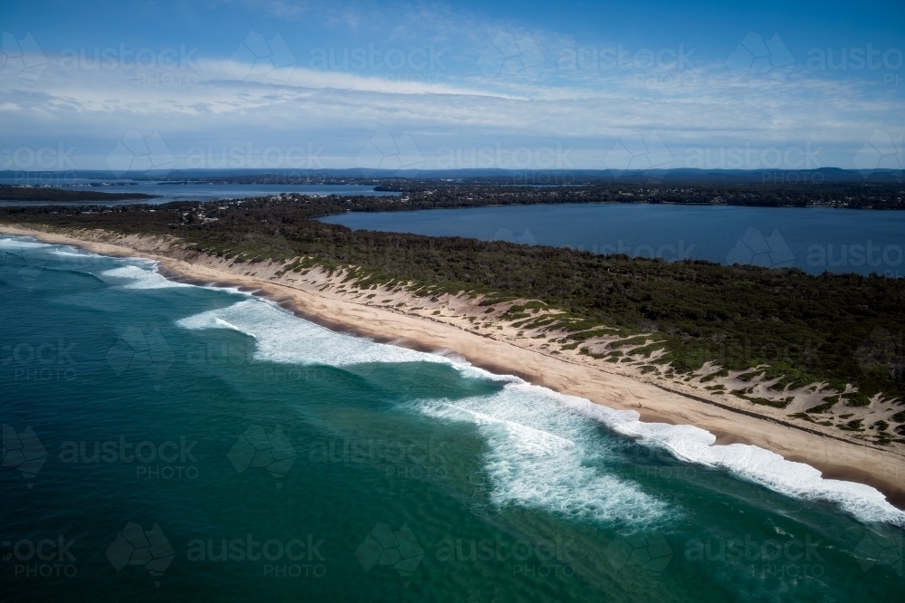 Aerial view of beach coastline and lake - Australian Stock Image