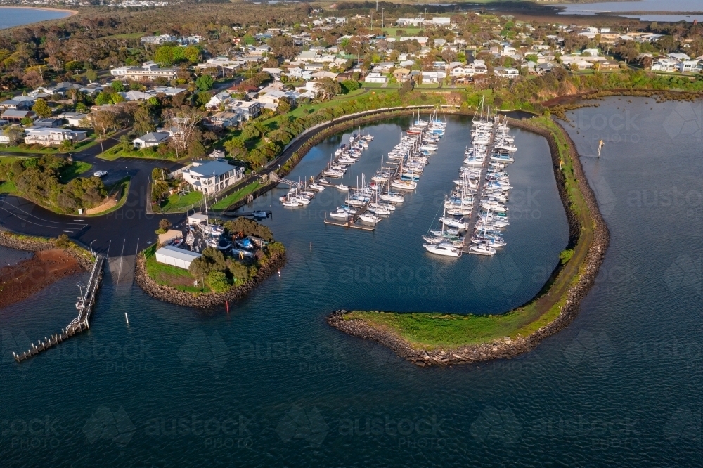 Image of Aerial view of boats and yachts anchored in a sheltered marina ...