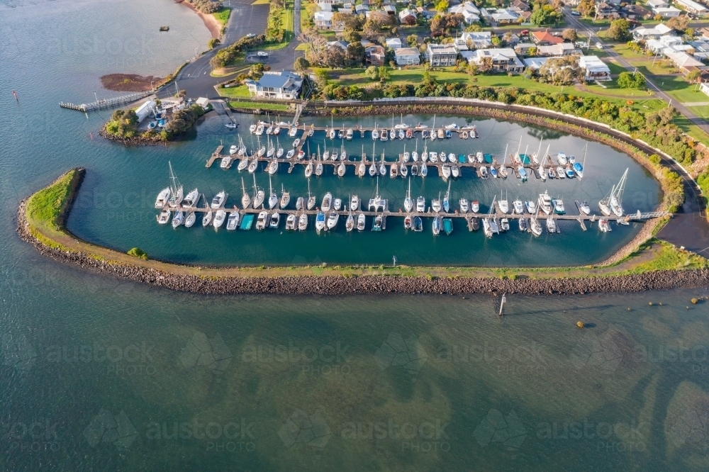 Image of Aerial view of boats and yachts anchored in a sheltered marina ...