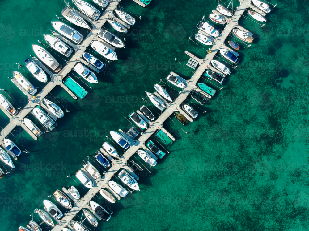 Aerial view of boats and yachts moored on jetties - Australian Stock Image