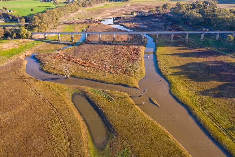 Aerial view of bridges crossing a series of narrow rivers - Australian Stock Image