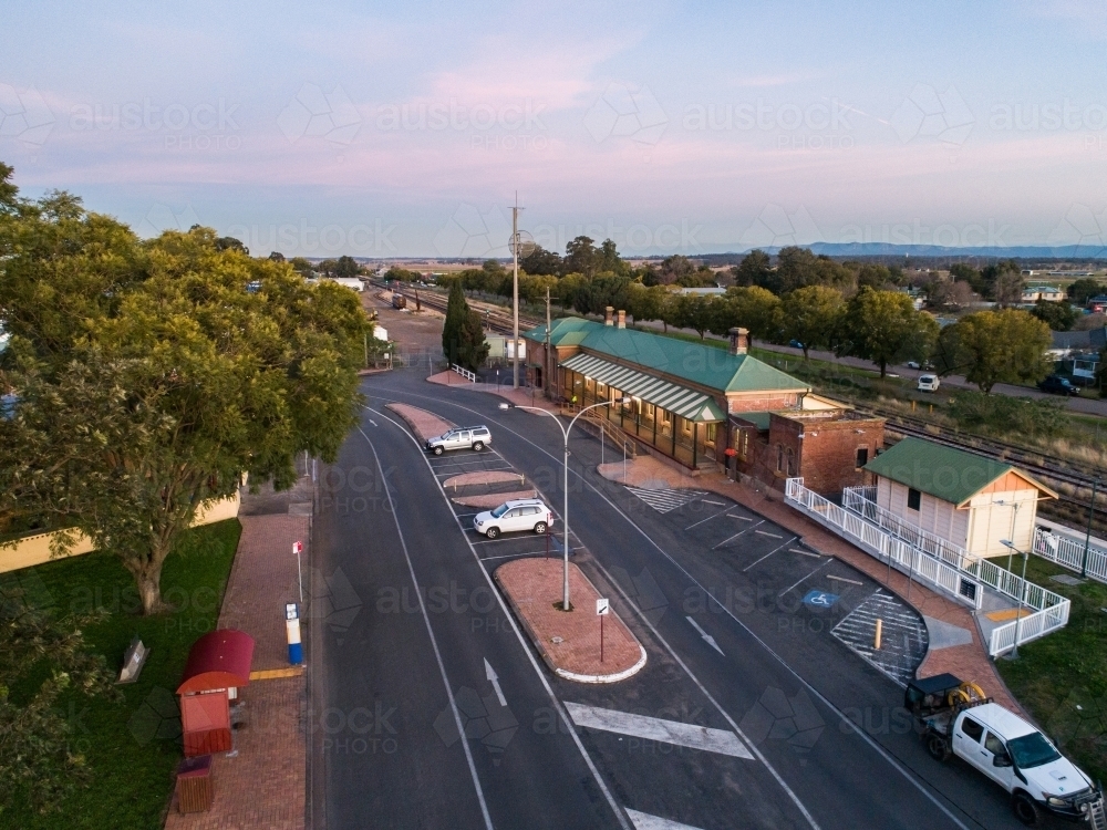 Aerial view of bus shelter and train station showing public transport infrastructure - Australian Stock Image