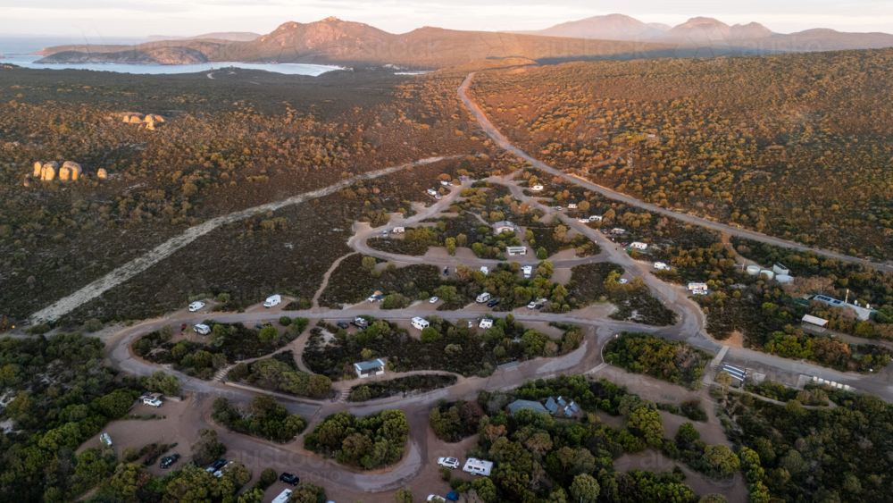 Aerial view of caravan park camping area by the coast - Australian Stock Image