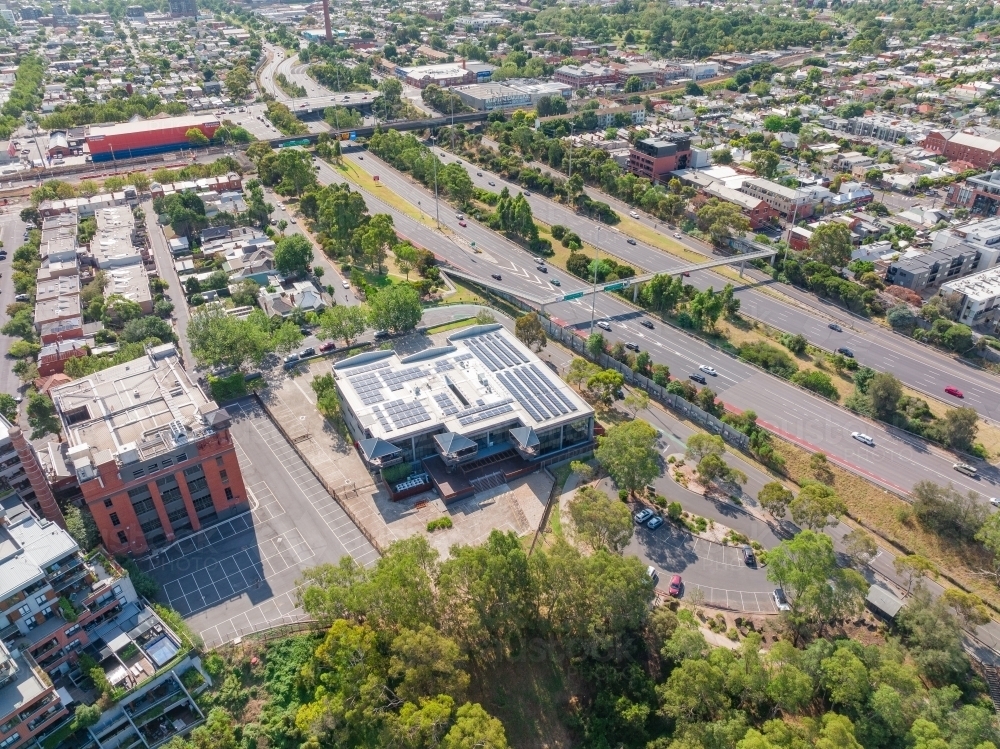Freeway Side Building Image of Aerial view of city buildings and and bridges on both side of ...
