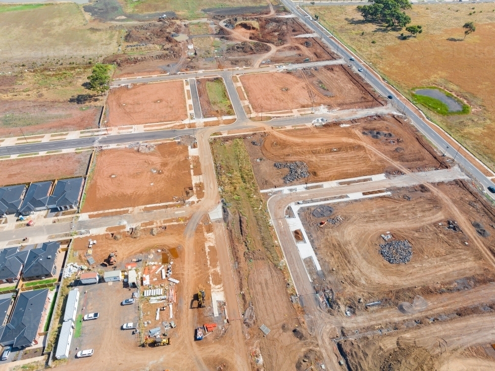 Image of Aerial view of cleared land blocks in an urban subdivision ...