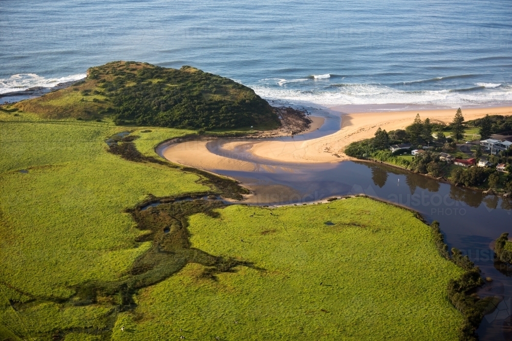 Image of Aerial view of coastal estuary - Austockphoto
