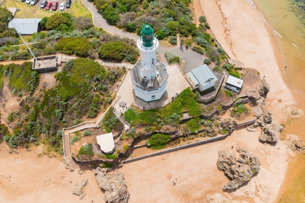 Image of Aerial view of coastal lighthouse on a rocky cliff top ...