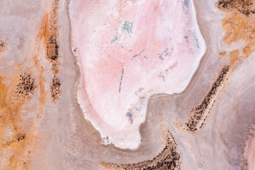 Aerial view of colourful patterns in a dry salt lake - Australian Stock Image