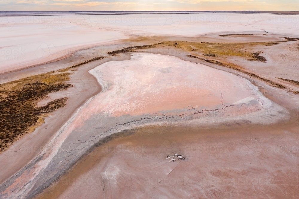Aerial view of colourful patterns in a dry salt lake - Australian Stock Image