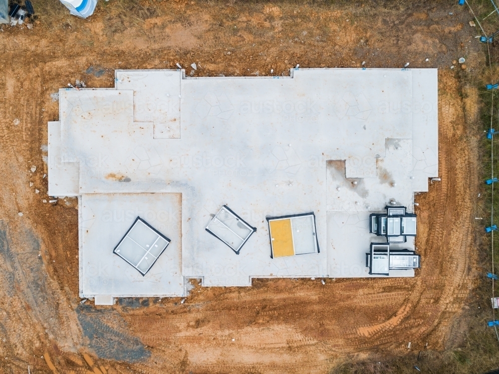 Aerial view of concrete slab for new house build - Australian Stock Image