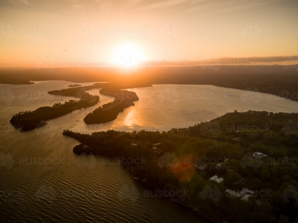 Aerial view of Dora Creek entering Lake Macquarie on the NSW Central Coast - Australian Stock Image