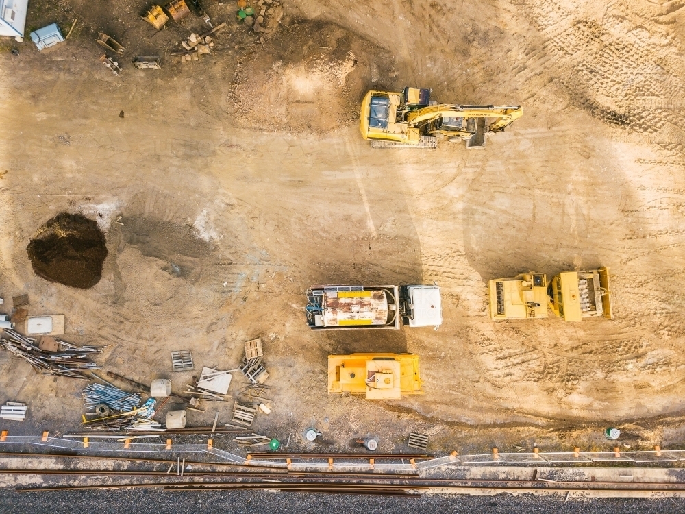 Aerial view of earthmoving machinery on a construction site - Australian Stock Image