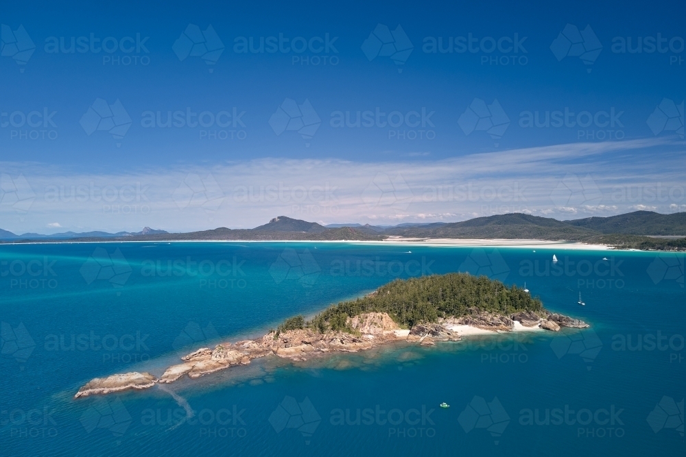Aerial view of Esk Island looking toward Whitehaven Beach. - Australian Stock Image