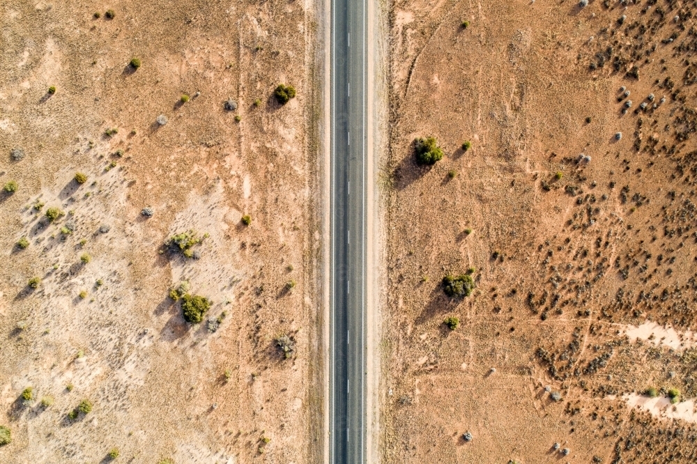Aerial view of Eyre Highway and Nullarbor Plain near Cocklebiddy, Western Australia. - Australian Stock Image