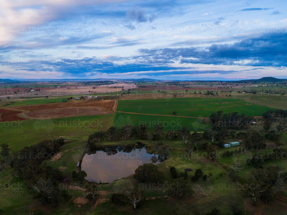 aerial view of farmland landscape with dam in central western New South Wales, Australia - Australian Stock Image