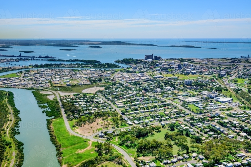 Aerial view of Gladstone city and harbor looking towards Curtis Island - Australian Stock Image