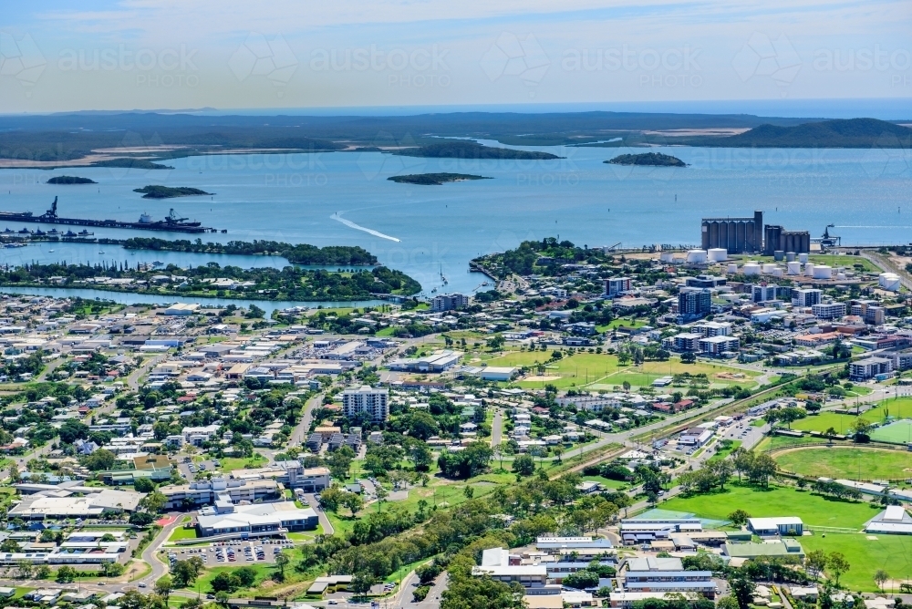 Aerial view of Gladstone city and harbor looking towards Curtis Island - Australian Stock Image