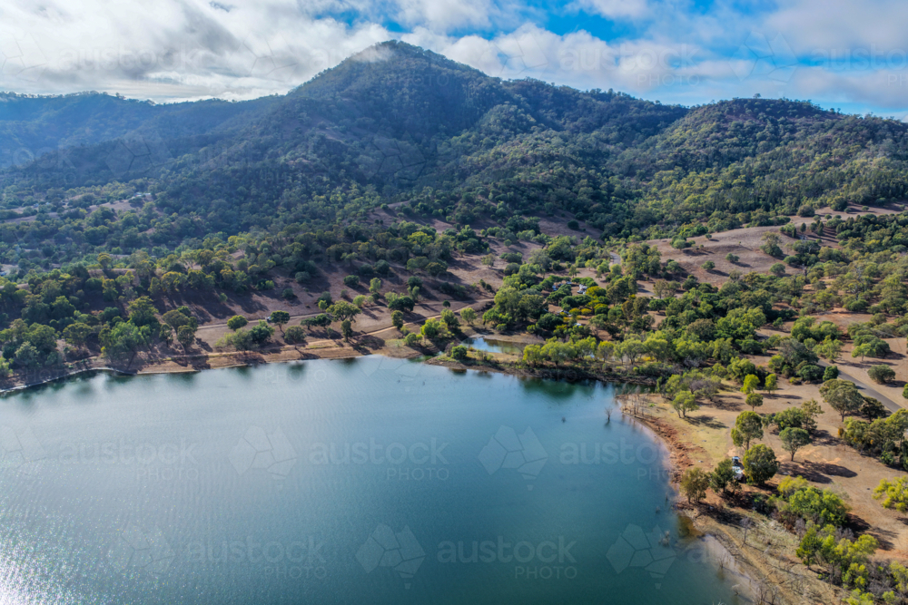 Aerial view of Glenbawn Dam and camping areas along the shoreline - Australian Stock Image