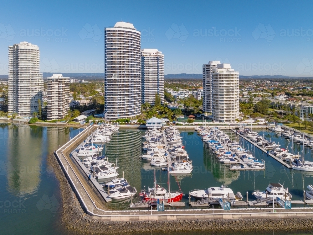Waterfront High Rises Image of Aerial view of high rise apartment towers and a boat marina ...