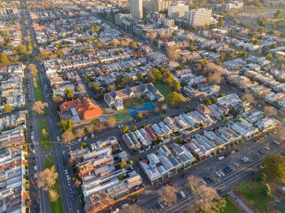 Aerial view of housing and retail properties close together on an inner city block - Australian Stock Image