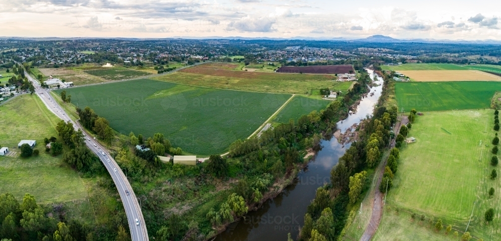 Aerial view of Hunter River running through farmland in town of Singleton, Hunter Valley, NSW - Australian Stock Image
