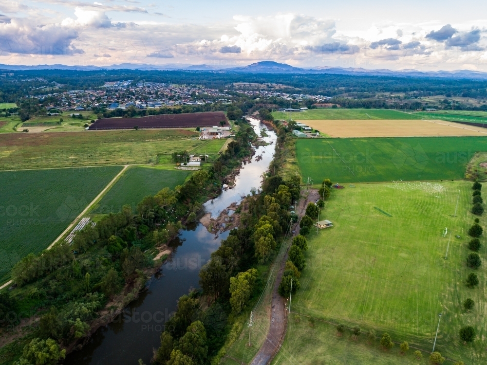 Aerial view of Hunter River running through farmland in town of Singleton, Hunter Valley, NSW - Australian Stock Image